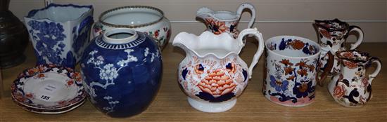 A collection of Victorian and later pottery two handled cider mugs, tankards, jugs and dishes